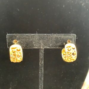 Set of three gold huggie earrings